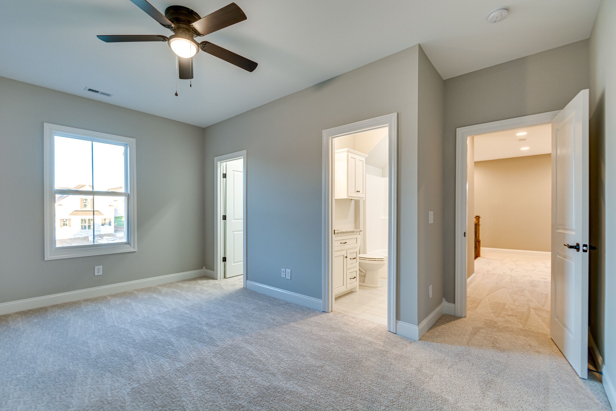 1016 Abbey Rd Way Spring Hill, TN 37174 - Photo 38 of 44 an empty room with chandelier fan and windows