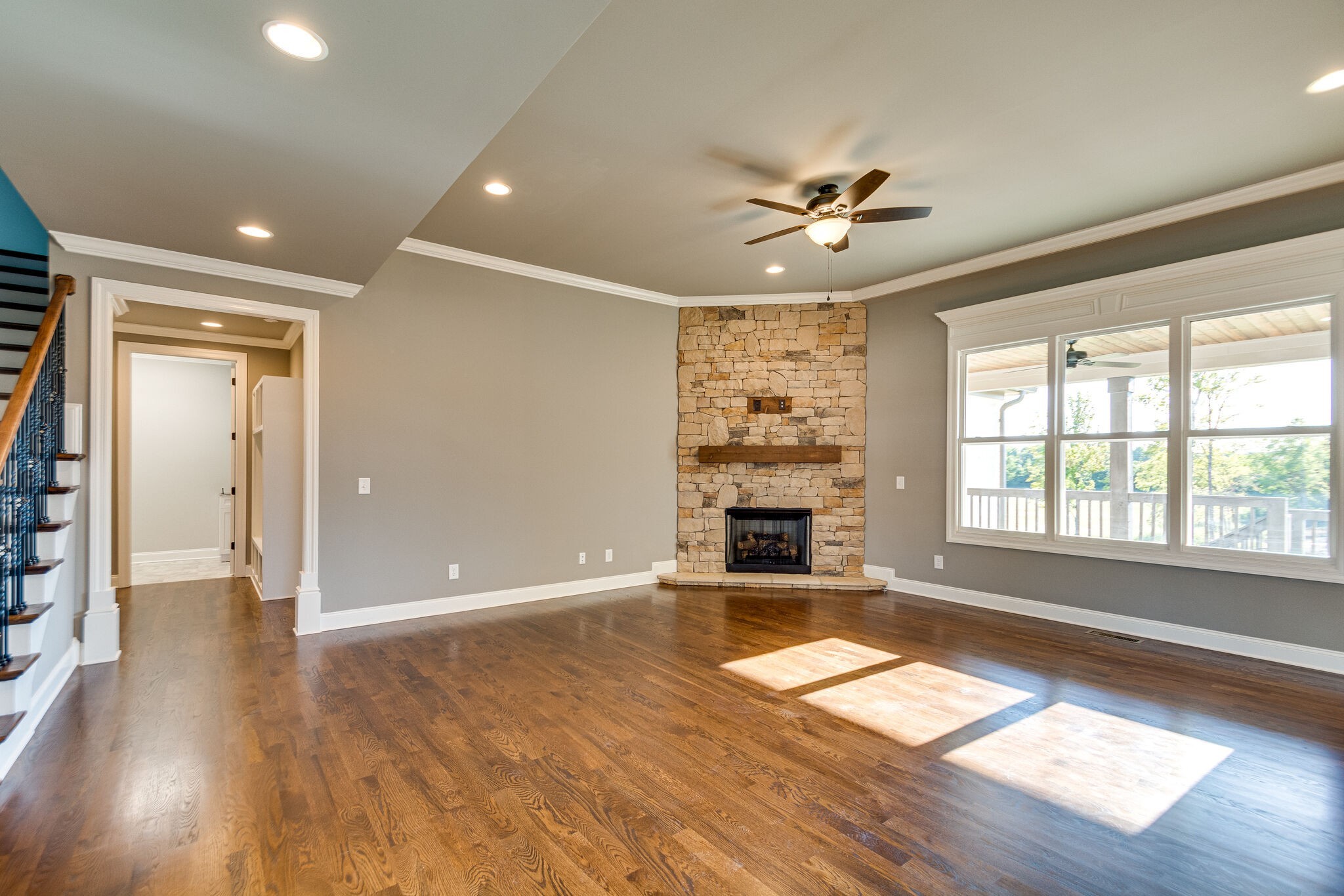 1016 Abbey Rd Way Spring Hill, TN 37174 - Photo 5 of 44 wooden floor in an empty room with a window