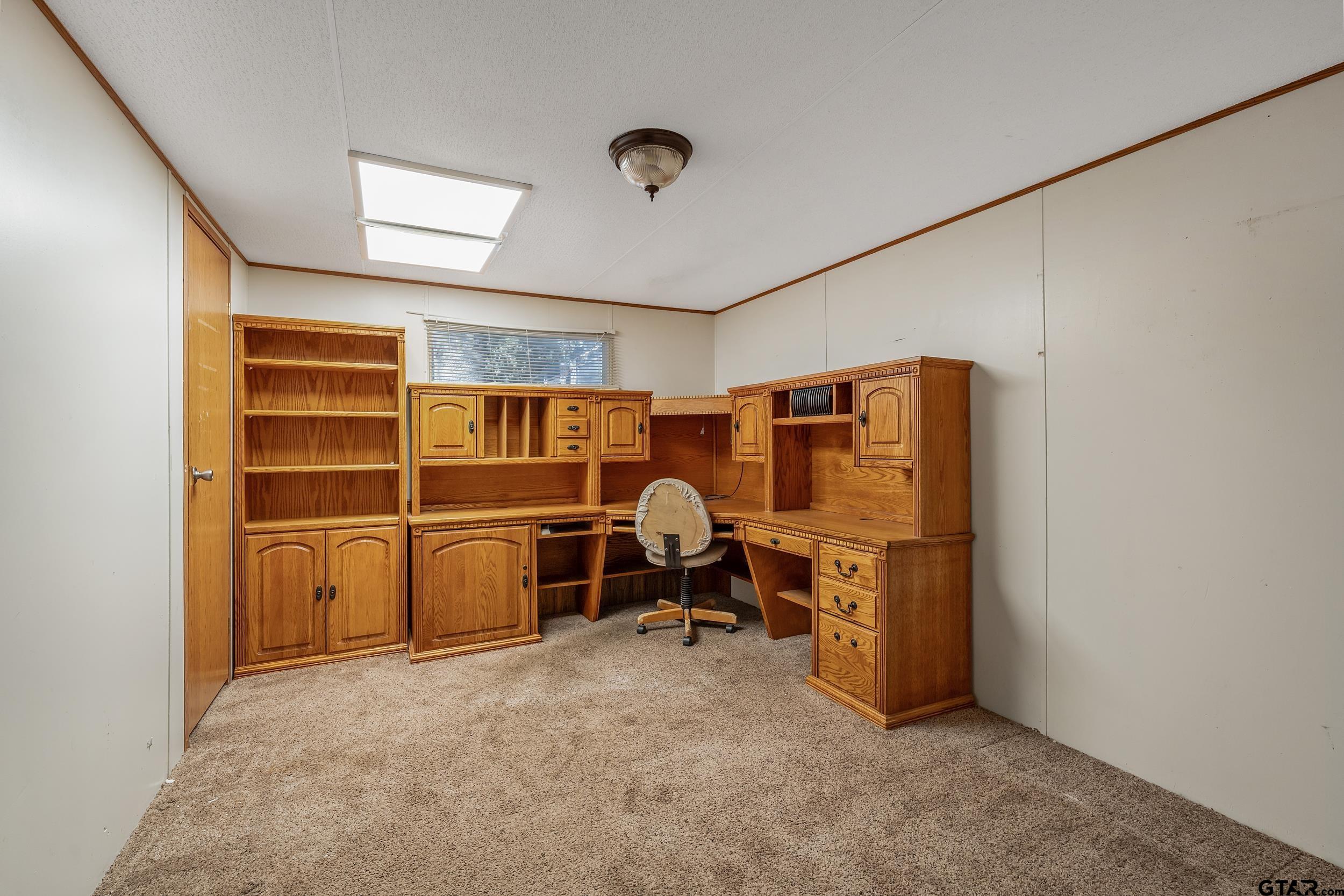 220 Broken Bow Quitman, TX 75783 - Photo 14 of 28 a view of a storage & utility room with washer and dryer