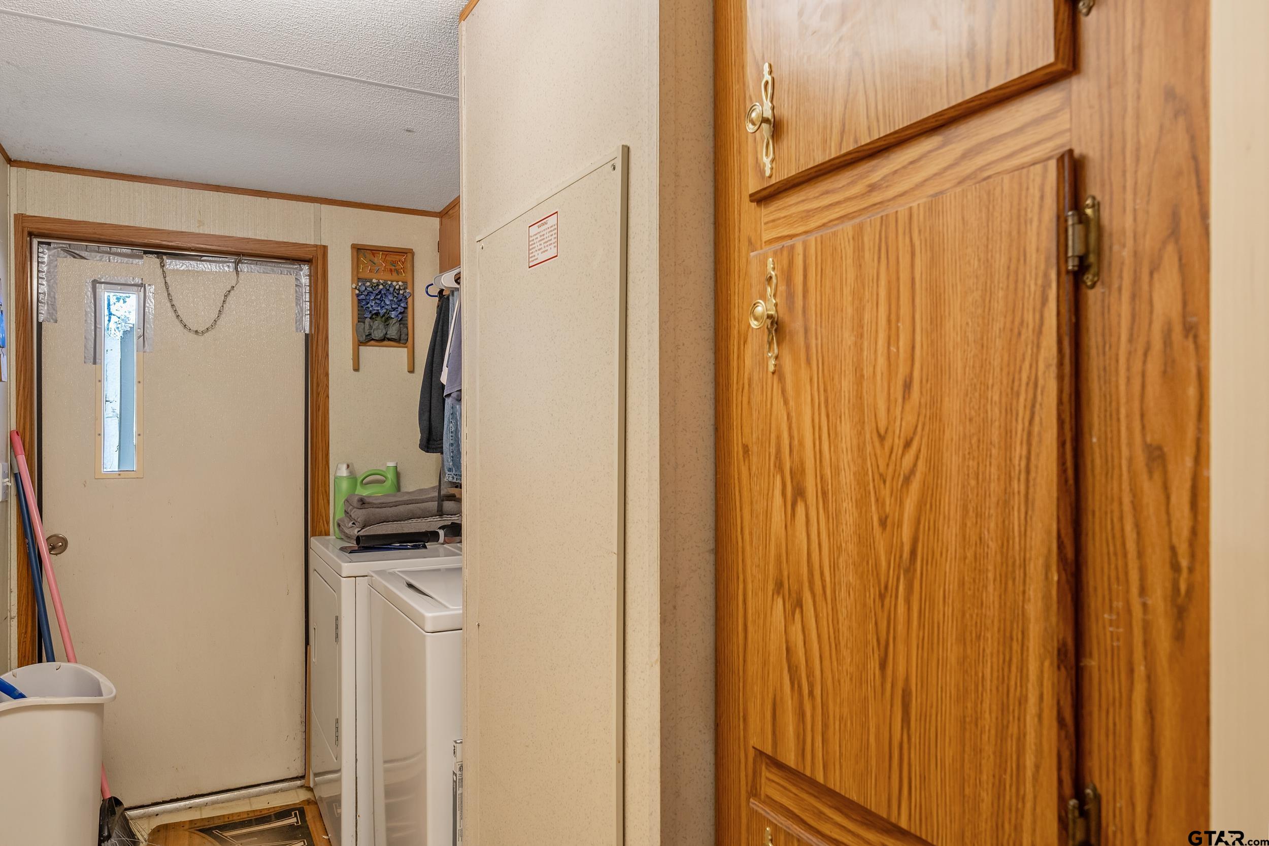 220 Broken Bow Quitman, TX 75783 - Photo 18 of 28 a bathroom with a shower and a sink