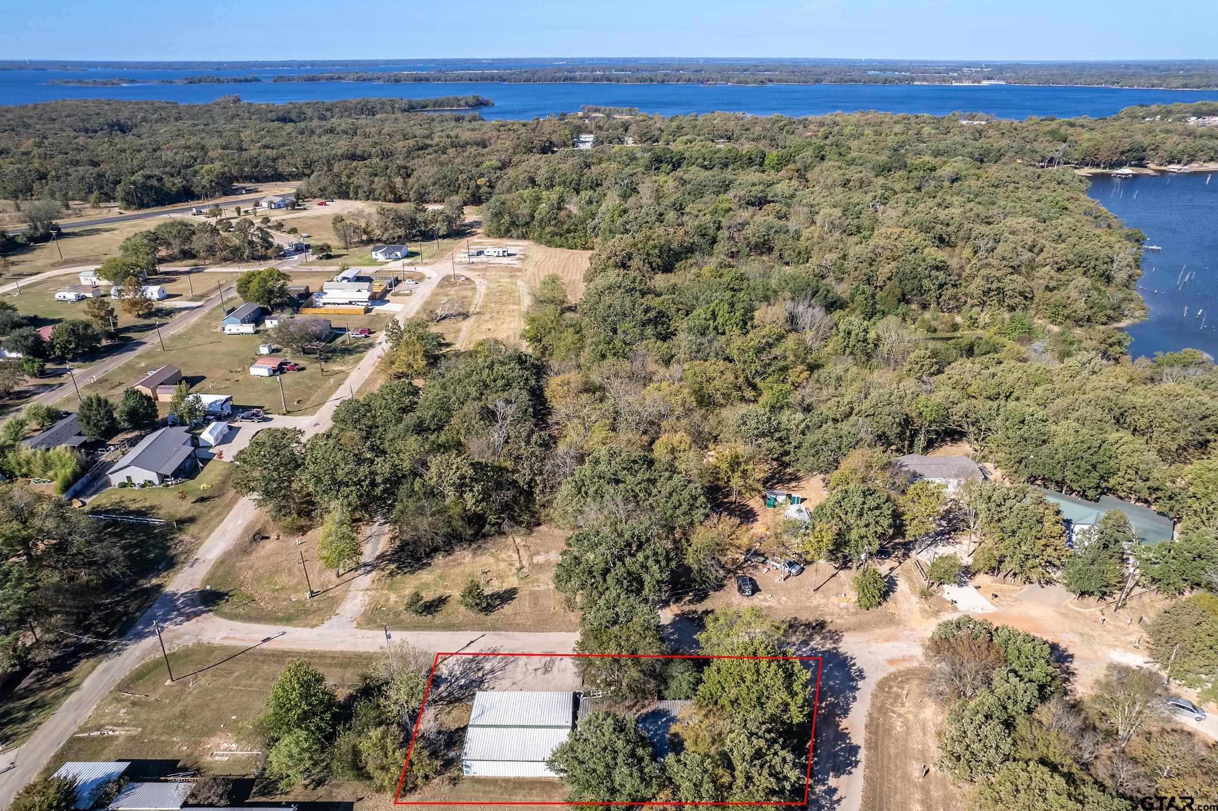 220 Broken Bow Quitman, TX 75783 - Photo 22 of 28 a view of a city with mountains in the background