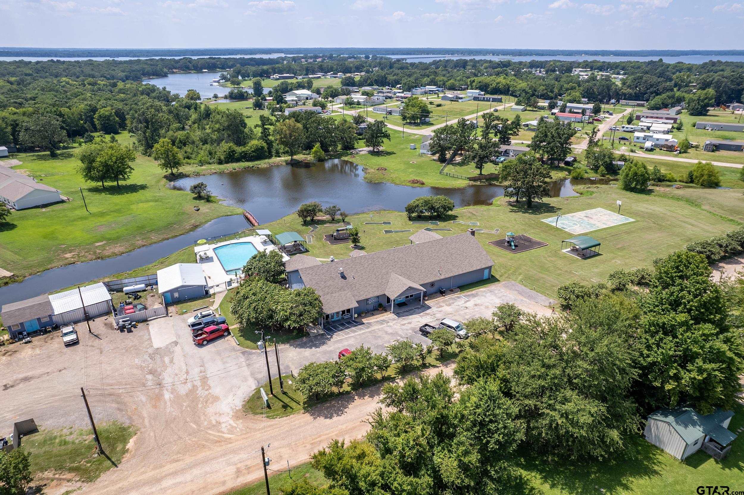 220 Broken Bow Quitman, TX 75783 - Photo 25 of 28 an aerial view of multiple house