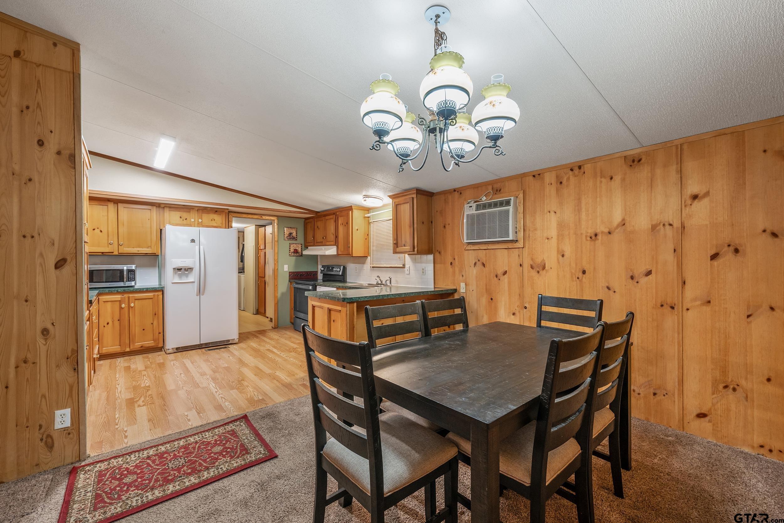 220 Broken Bow Quitman, TX 75783 - Photo 7 of 28 a view of a dining room with furniture