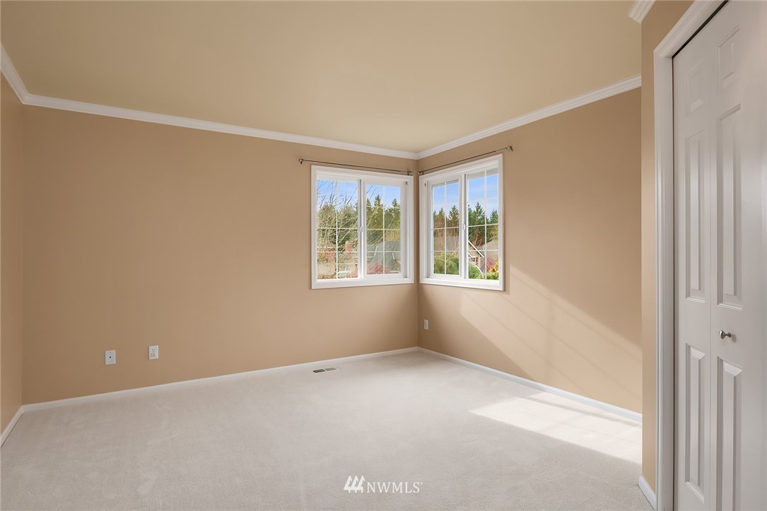3013 213th Street Southeast Bothell, WA 98021 - Photo 22 of 25 an empty room with windows