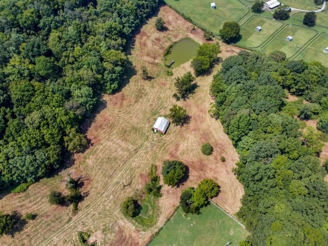3442 Sweeney Hollow Road Franklin, TN 37064 - Photo 8 of 15 an aerial view of a house with a yard and trees all around