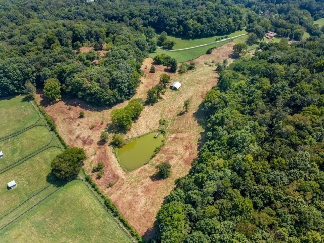3442 Sweeney Hollow Road Franklin, TN 37064 - Photo 9 of 15 an aerial view of a house with a yard and lake view