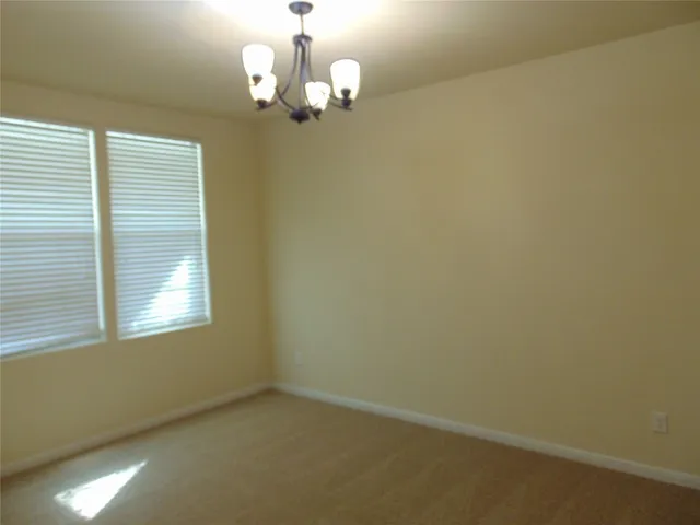 en empty room with a window