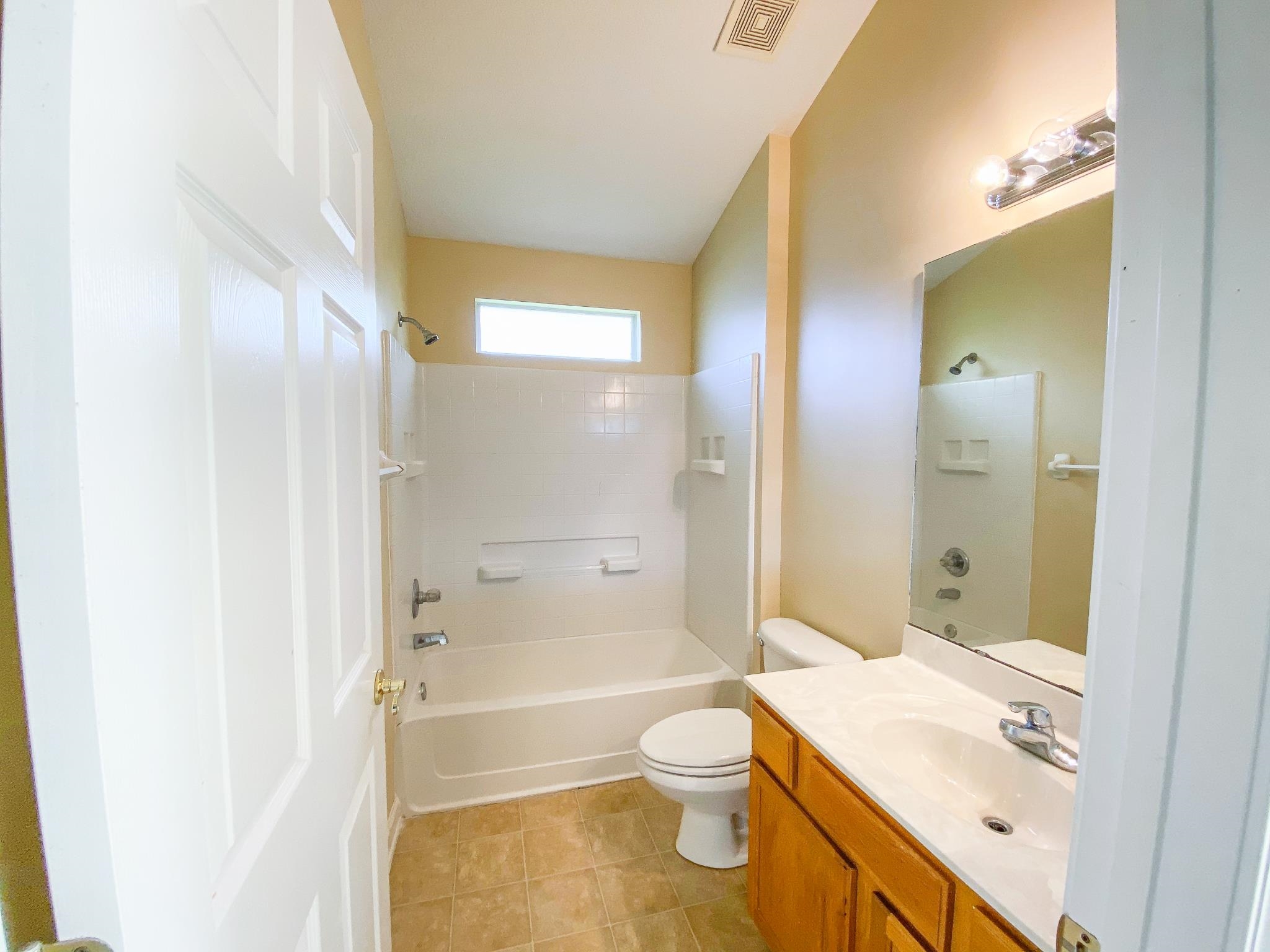 871 East Red House Branch Road St. Augustine, FL 32084 - Photo 18 of 23 a bathroom with a sink a toilet and shower