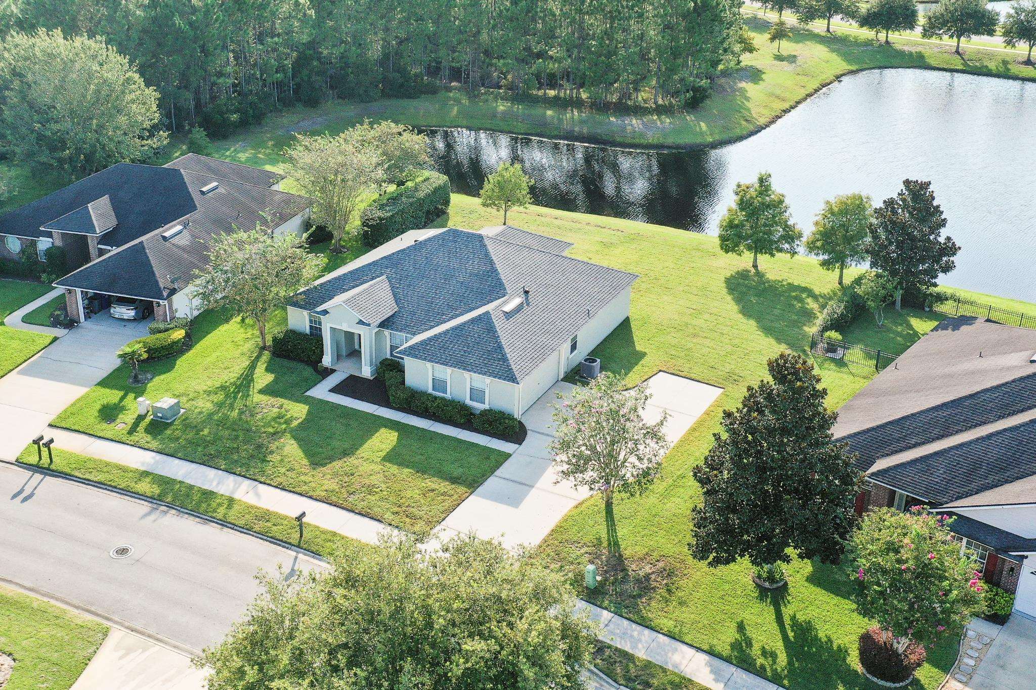 871 East Red House Branch Road St. Augustine, FL 32084 - Photo 4 of 23 an aerial view of a house