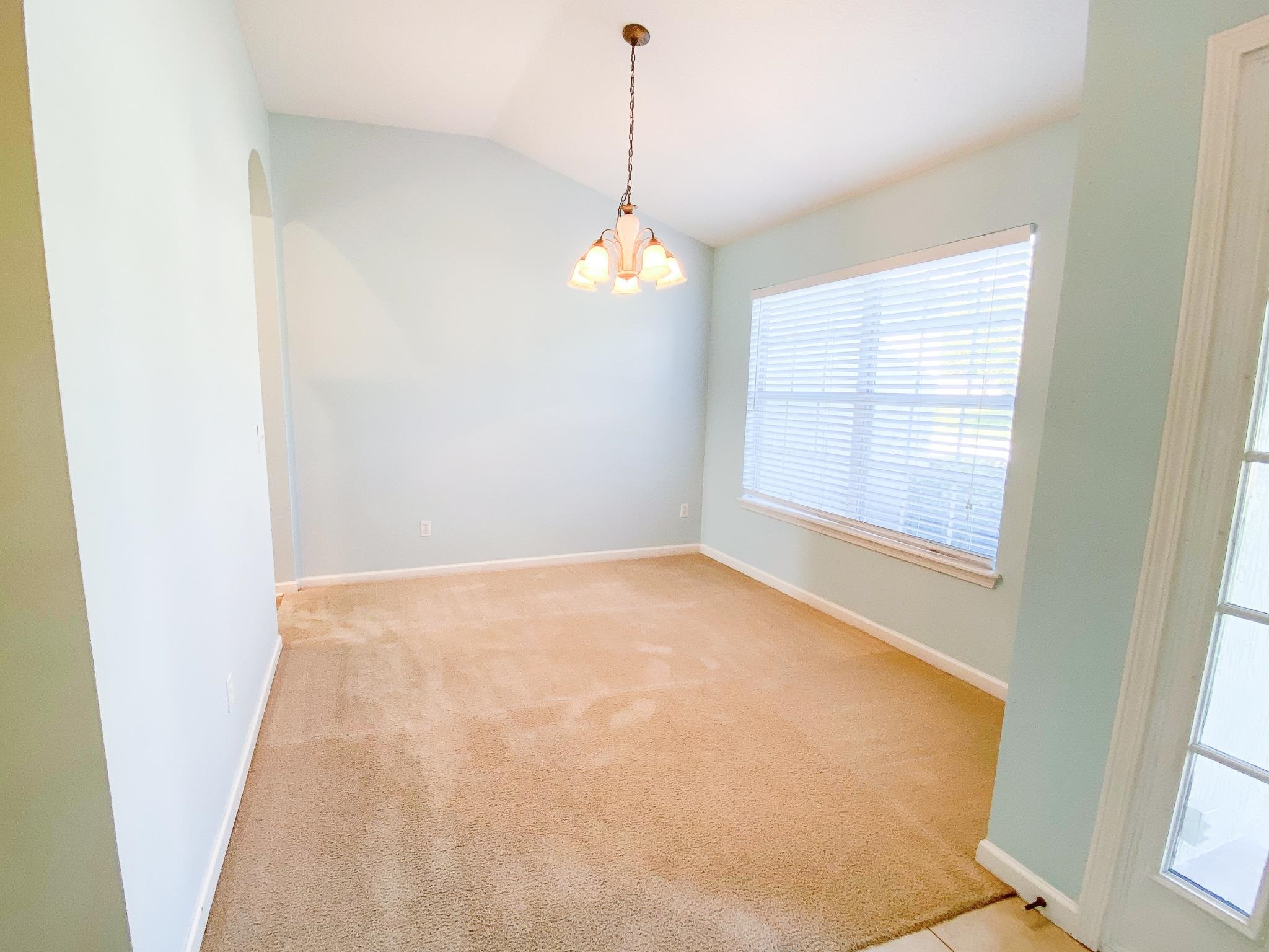 871 East Red House Branch Road St. Augustine, FL 32084 - Photo 8 of 23 a view of an empty room with a window