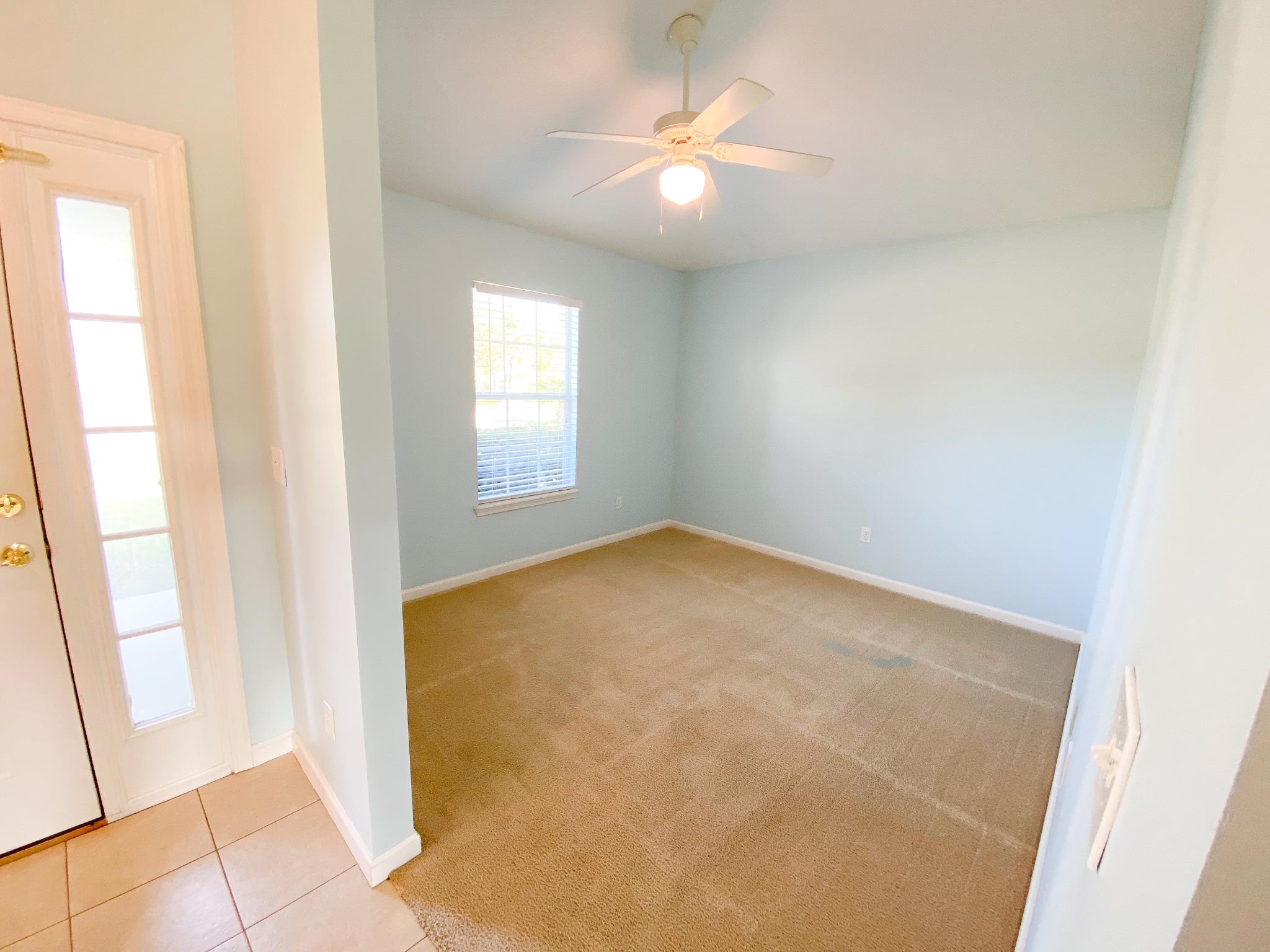 871 East Red House Branch Road St. Augustine, FL 32084 - Photo 9 of 23 an empty room with a window