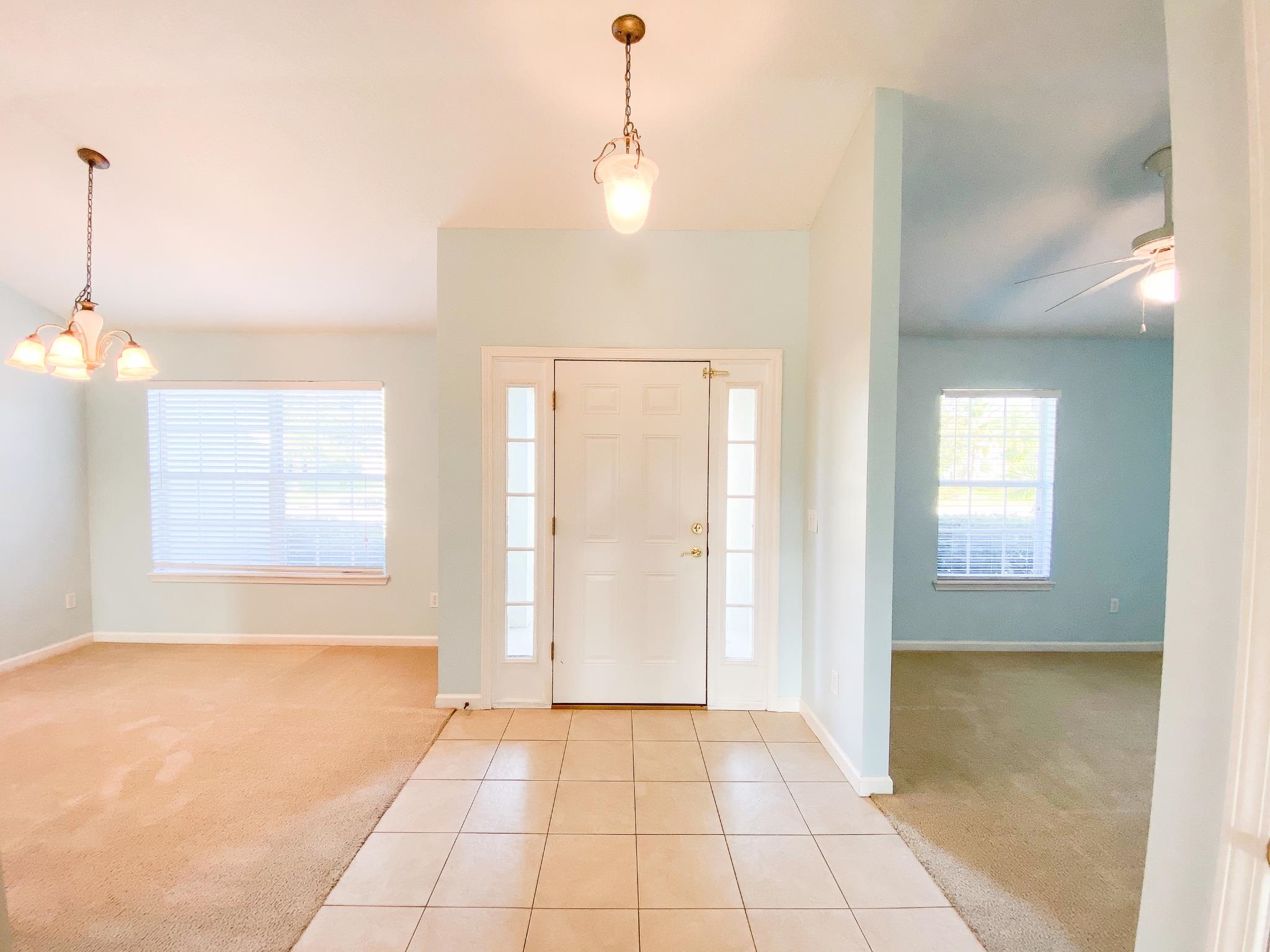 871 East Red House Branch Road St. Augustine, FL 32084 - Photo 10 of 23 a view of an empty room with window and wooden floor