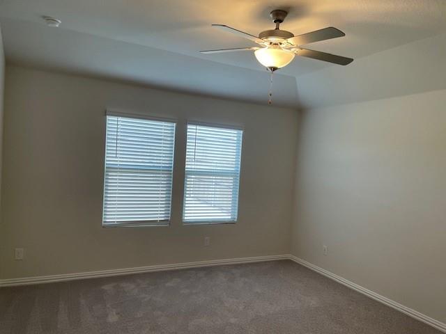 3116 Kingsgarden Road Denton, TX 76207 - Photo 15 of 20 an empty room with a window and a fan