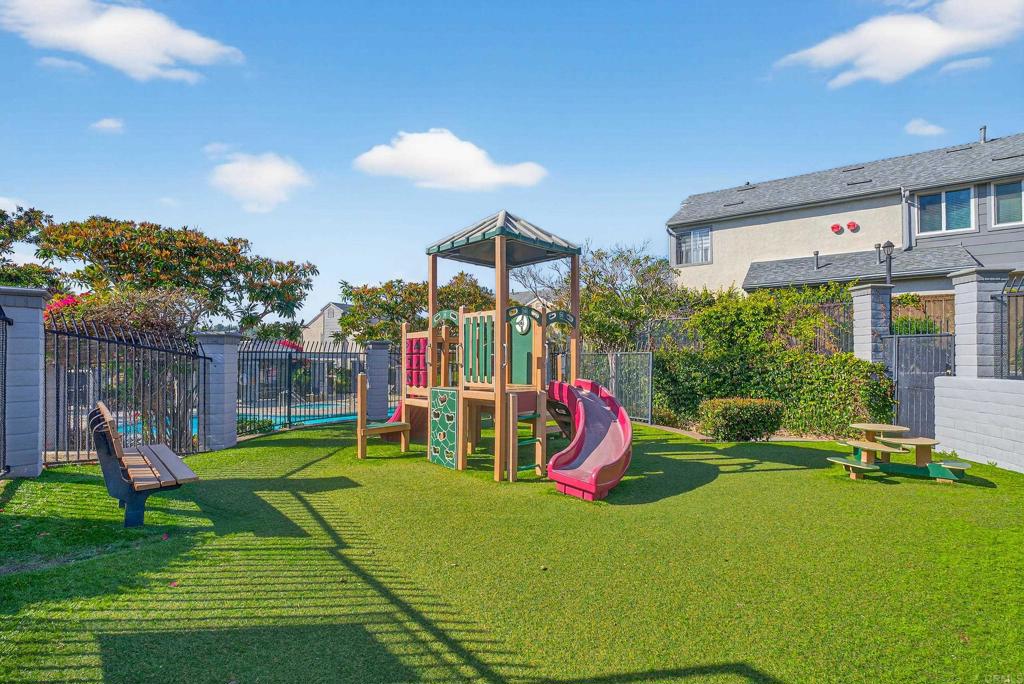 8927 Windham Court Spring Valley, CA 91977 - Photo 19 of 28 a view of a house with a backyard and a patio