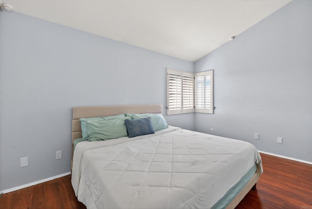 8927 Windham Court Spring Valley, CA 91977 - Photo 10 of 28 a bedroom with a bed and window