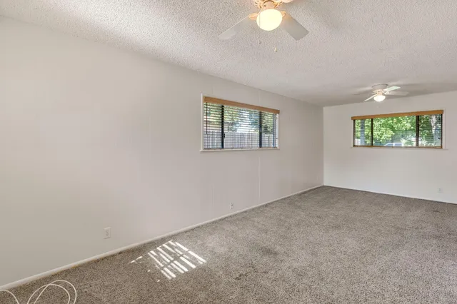 an empty room with windows