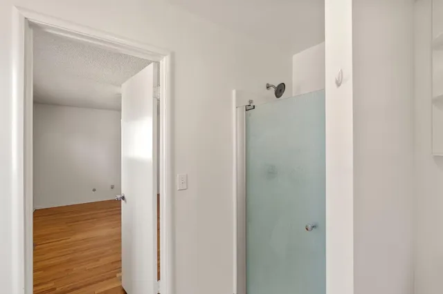 a view of a bathroom from the hallway