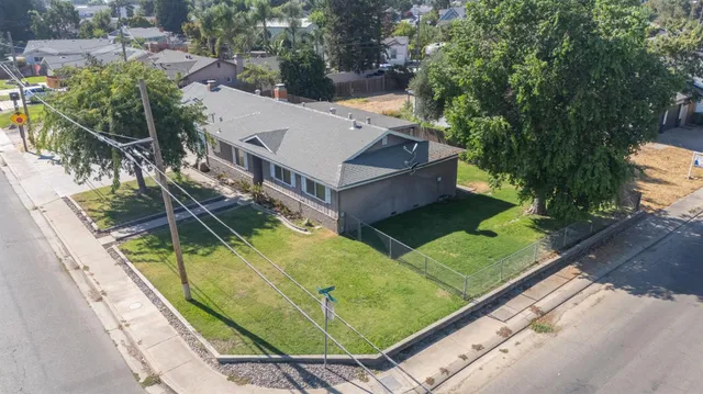 a view of a swimming pool with a patio