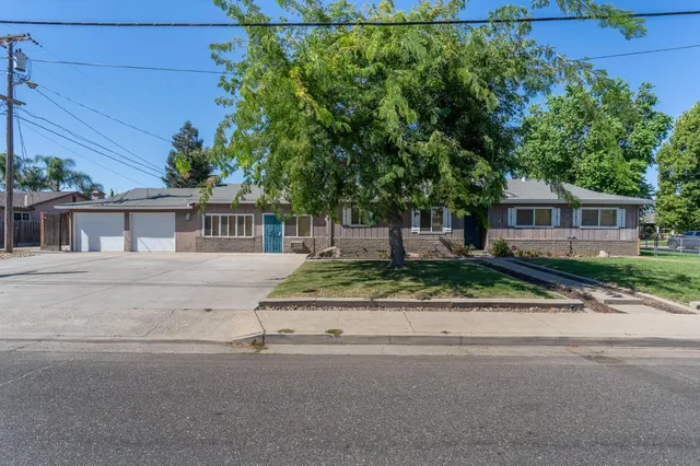 front view of house with a yard