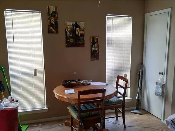 a view of a workspace with furniture
