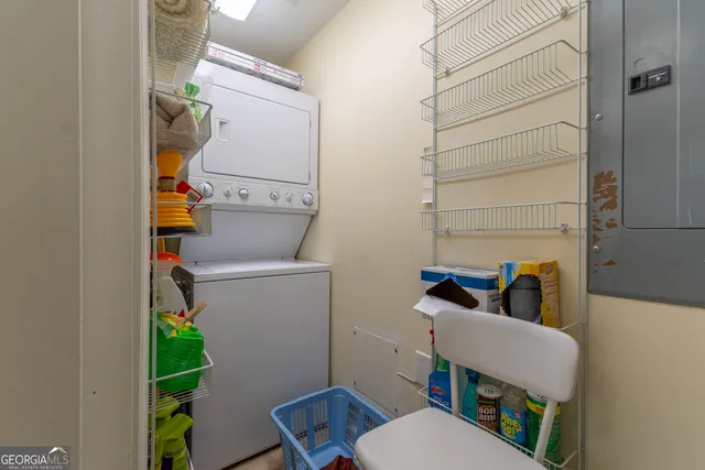 a bedroom with bed and a window