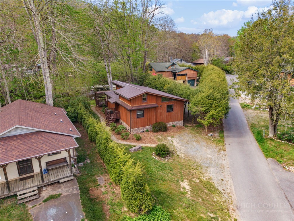 139 Golden Rod Loop Newland, NC 28657 - Photo 37 of 39 an aerial view of a house with a yard basket ball court and outdoor seating