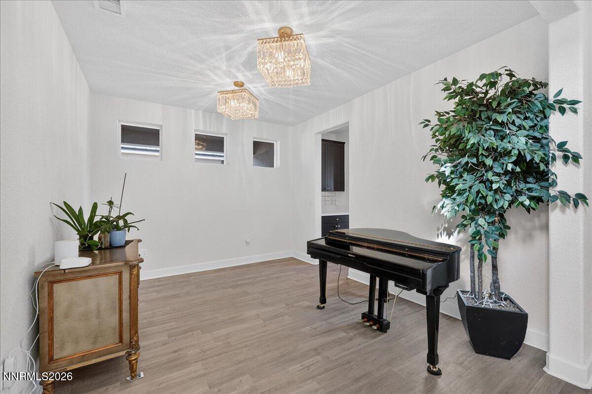 1280 Harness Drive Sparks, NV 89436 - Photo 15 of 46 a view of a livingroom with furniture and a potted plant