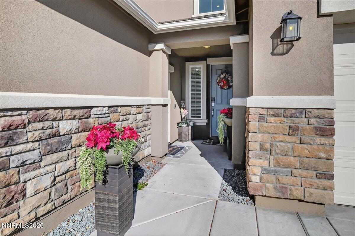 1280 Harness Drive Sparks, NV 89436 - Photo 2 of 46 a bath room with a potted plant