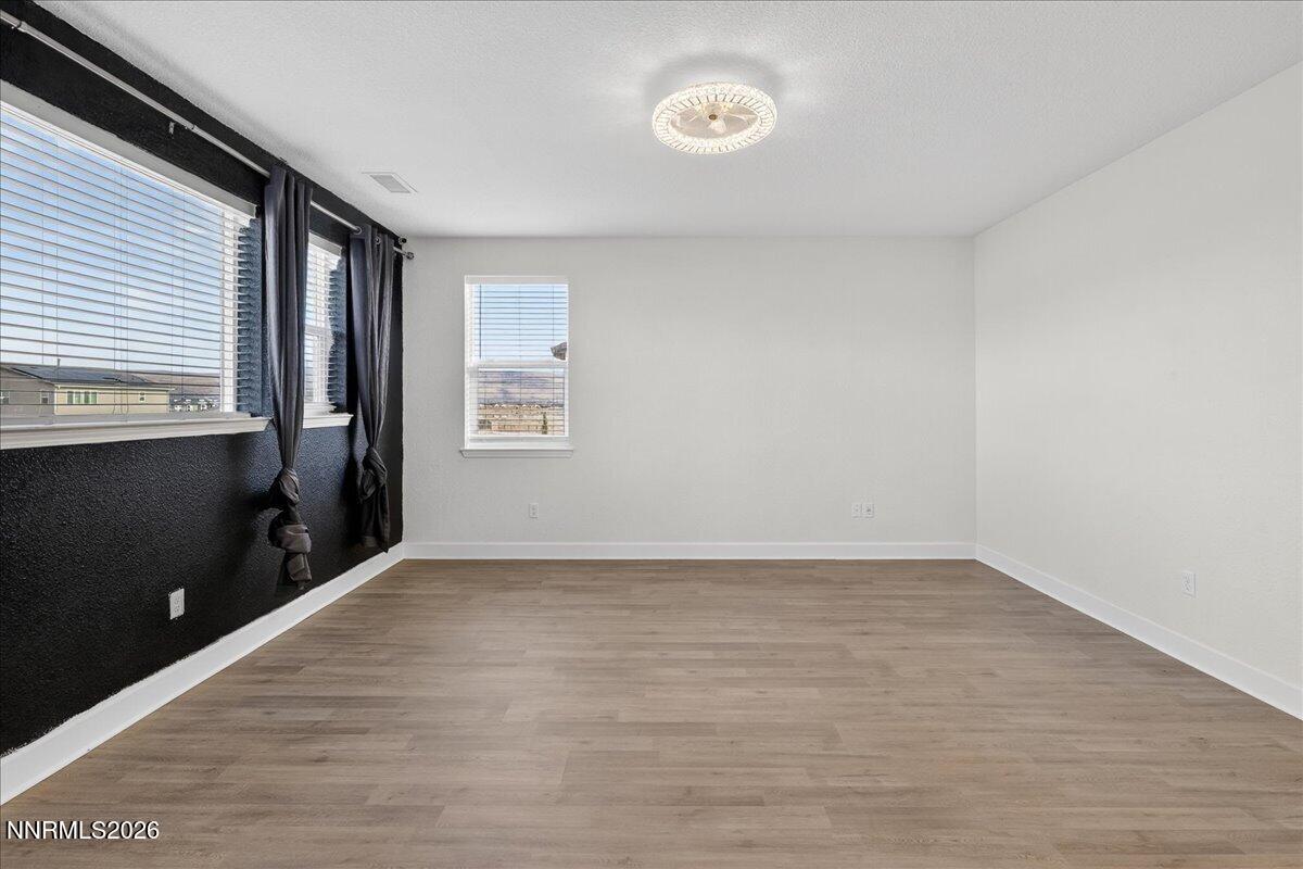 1280 Harness Drive Sparks, NV 89436 - Photo 21 of 46 a view of an empty room with a window