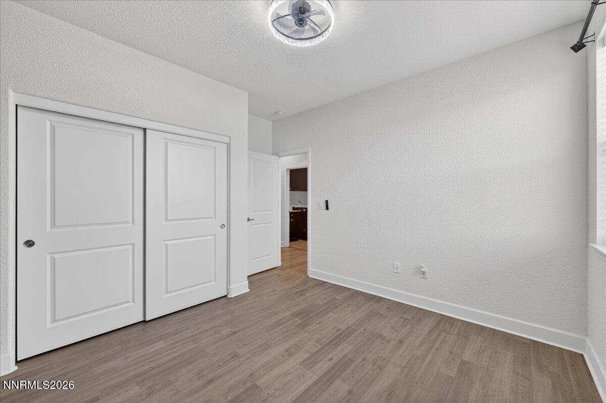 1280 Harness Drive Sparks, NV 89436 - Photo 30 of 46 a view of an empty room and wooden floor