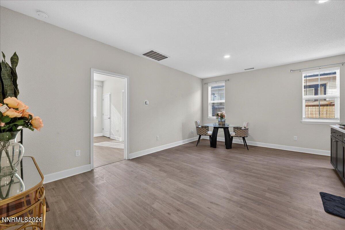 1280 Harness Drive Sparks, NV 89436 - Photo 36 of 46 a view of an empty room with a window and wooden floor