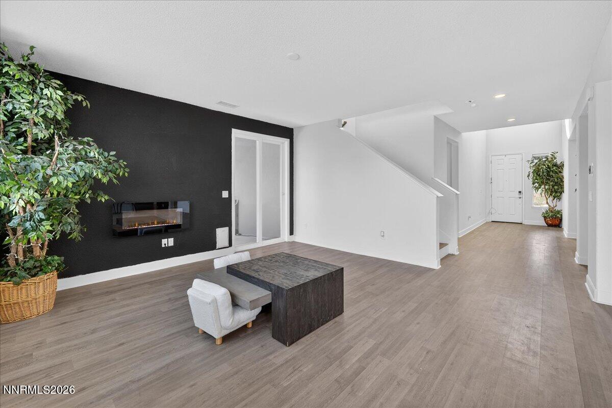 1280 Harness Drive Sparks, NV 89436 - Photo 4 of 46 a living room with furniture and a potted plant