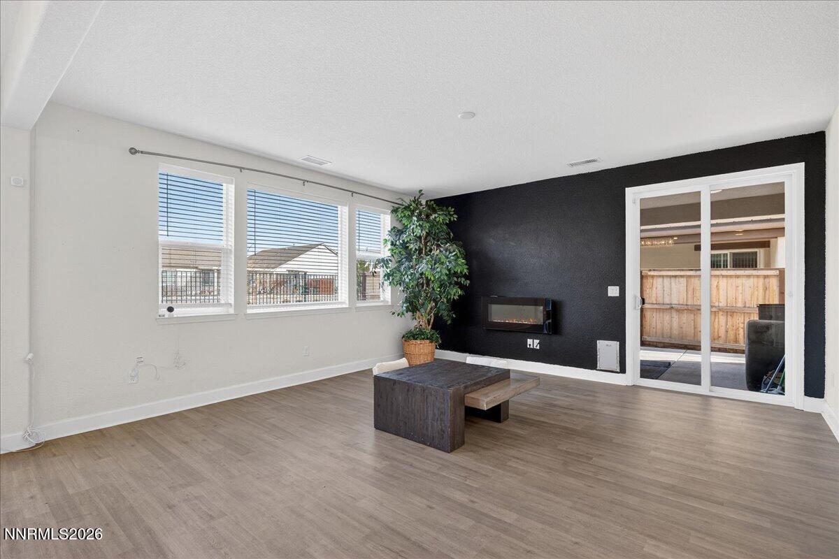 1280 Harness Drive Sparks, NV 89436 - Photo 5 of 46 a living room with furniture and a fireplace
