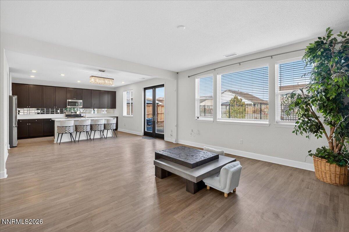1280 Harness Drive Sparks, NV 89436 - Photo 6 of 46 a living room with furniture and a wooden floor