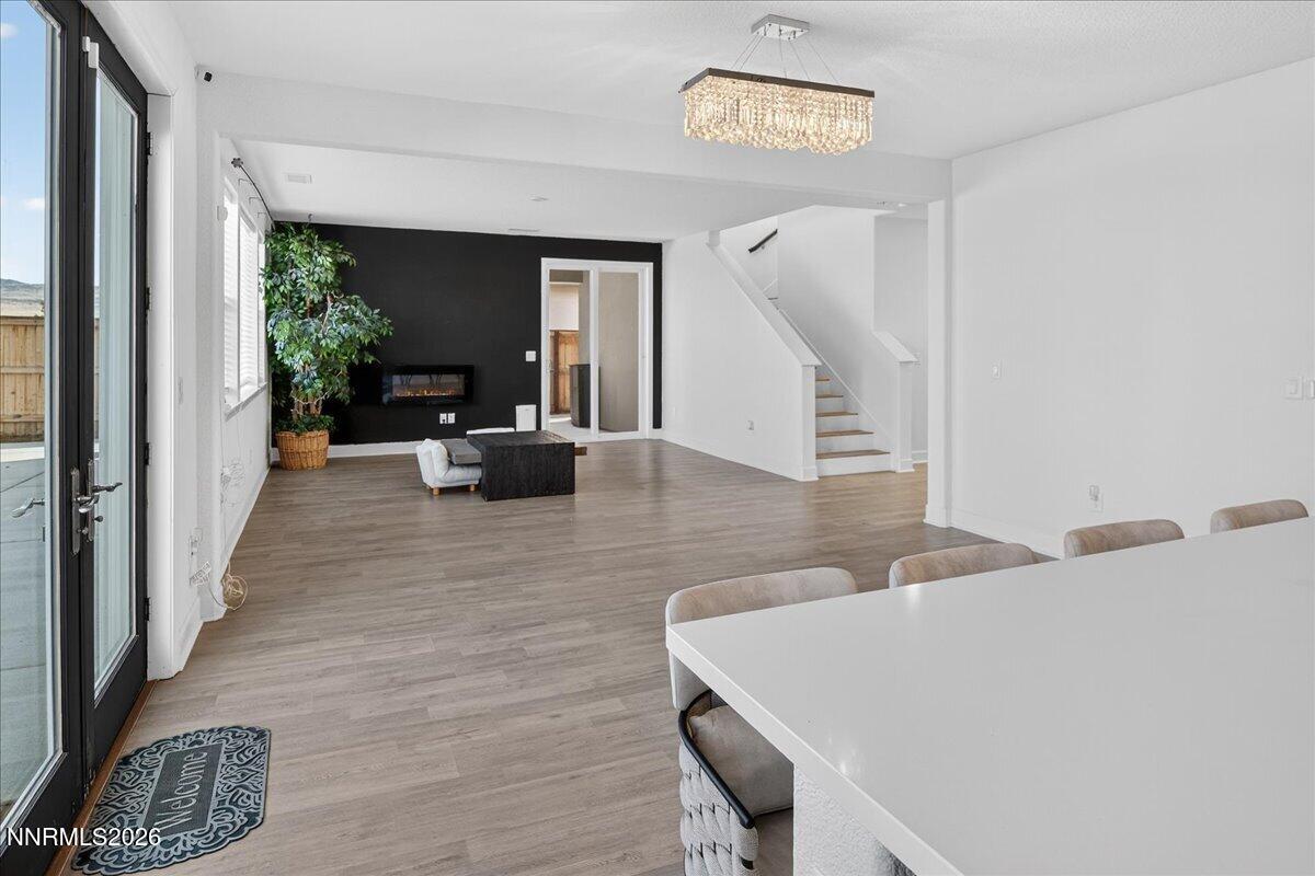 1280 Harness Drive Sparks, NV 89436 - Photo 8 of 46 a living room with furniture and a chandelier