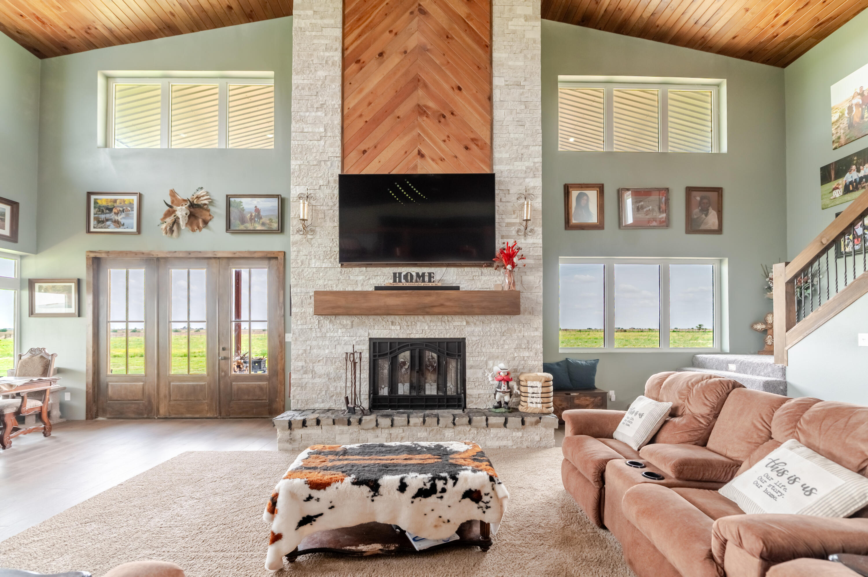 6792 Maine Road Anton, TX 79313 - Photo 29 of 77 a living room with furniture fireplace and flat screen tv
