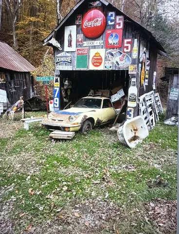 a outdoor space with lots of swings and slides