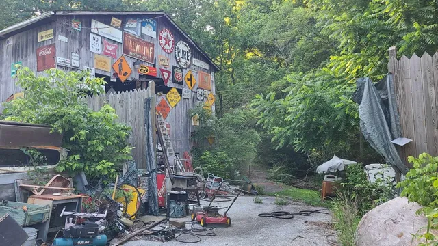 a view of a chairs and tables in the back yard of the house