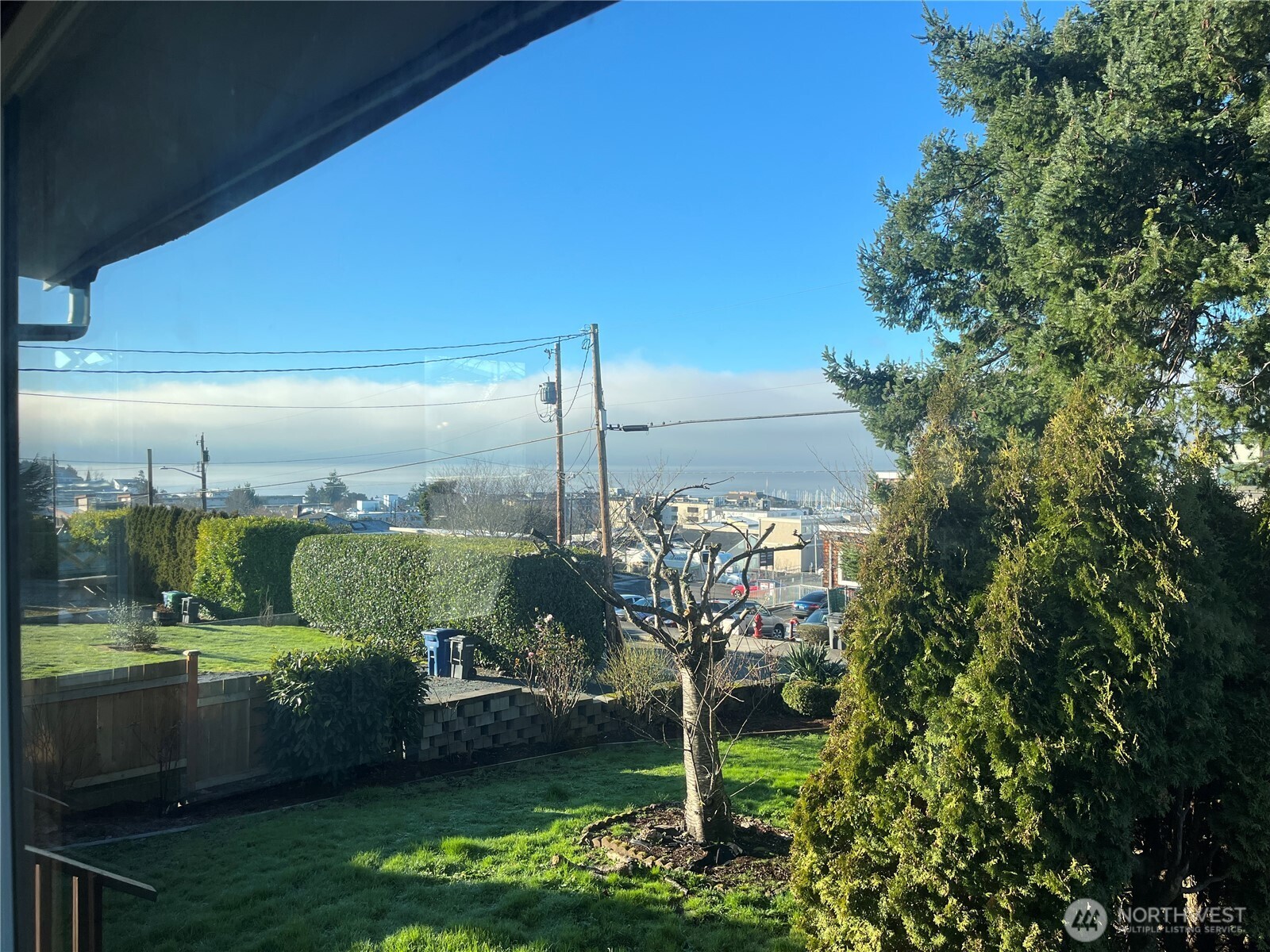 a view of a balcony with sitting area