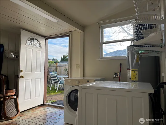 a utility room with dryer and washer