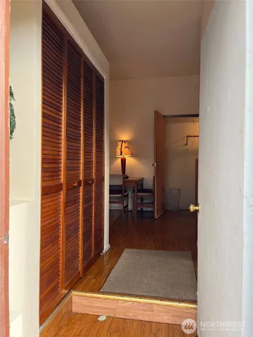 a view of swimming pool from a bathroom