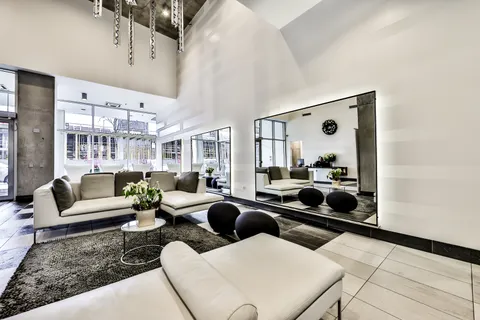 a living room with furniture and view of living room