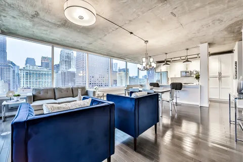 a kitchen with a sink and wooden cabinets