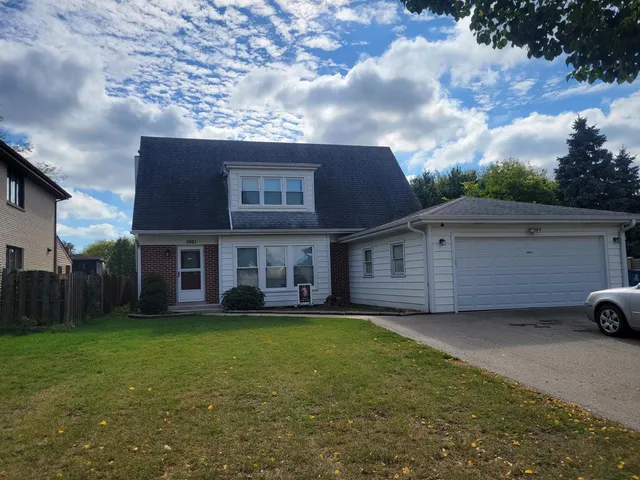a view of a yard in front of a house