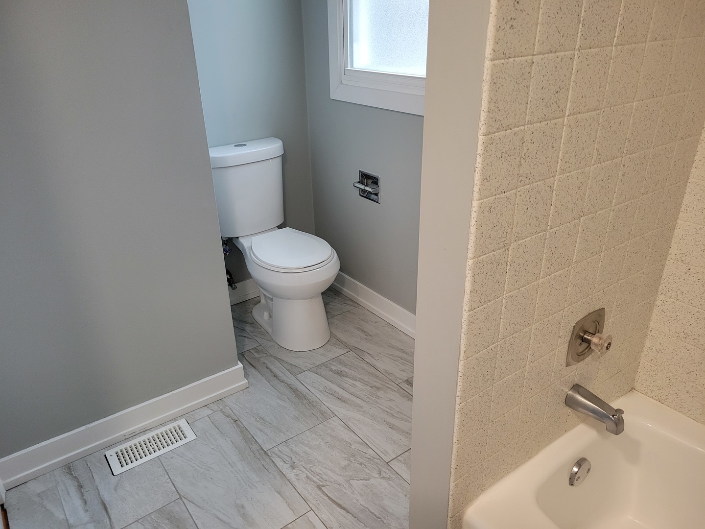 1001 East Callero Circle, Unit 2 Mount Prospect, IL 60056 - Photo 8 of 14 a bathroom with a toilet and a sink