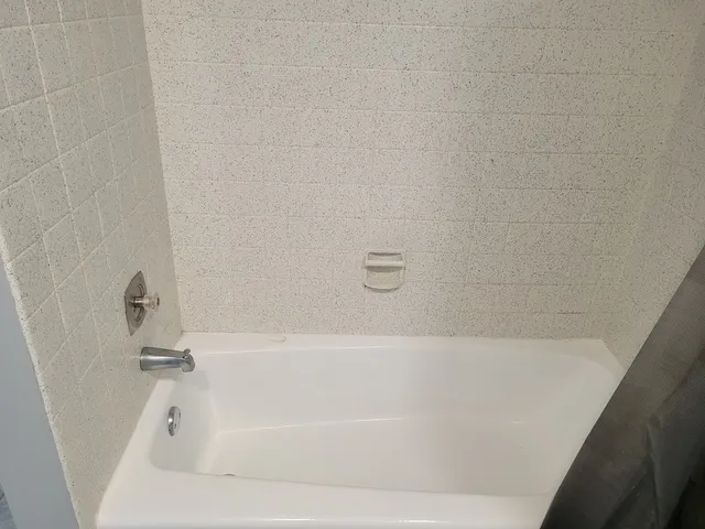 a bathroom with a bathtub