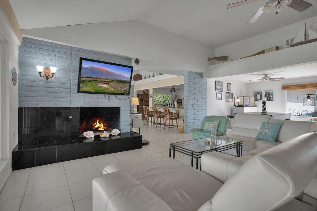 43761 Port Maria Road Bermuda Dunes, CA 92203 - Photo 13 of 50 a living room with furniture and a fireplace