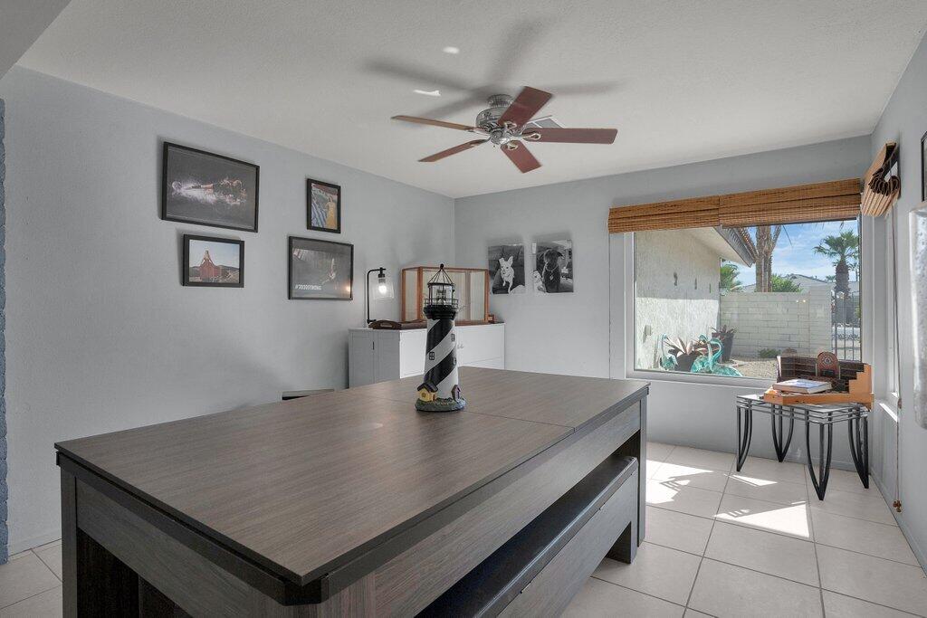 43761 Port Maria Road Bermuda Dunes, CA 92203 - Photo 14 of 50 a living room with hard wood flooring and a table