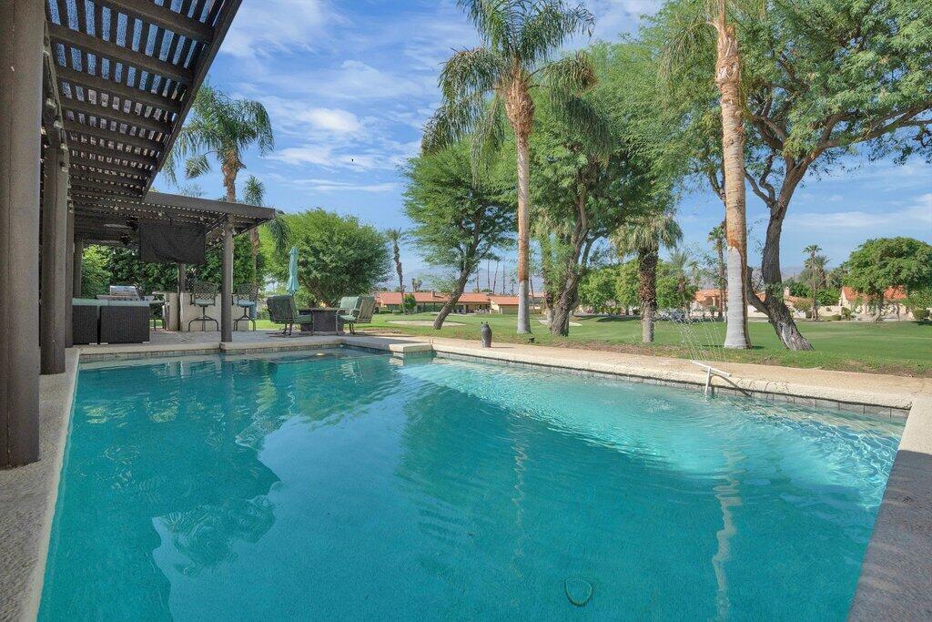 43761 Port Maria Road Bermuda Dunes, CA 92203 - Photo 2 of 50 a view of a swimming pool with a patio