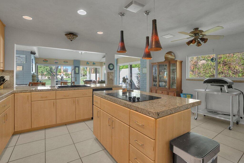 43761 Port Maria Road Bermuda Dunes, CA 92203 - Photo 22 of 50 a kitchen with sink cabinets and window